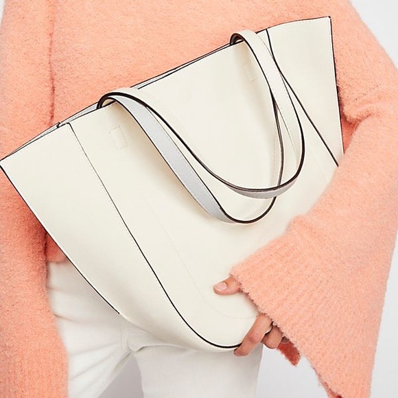 Free People Handbags - Free People reversible Half Moon Tote